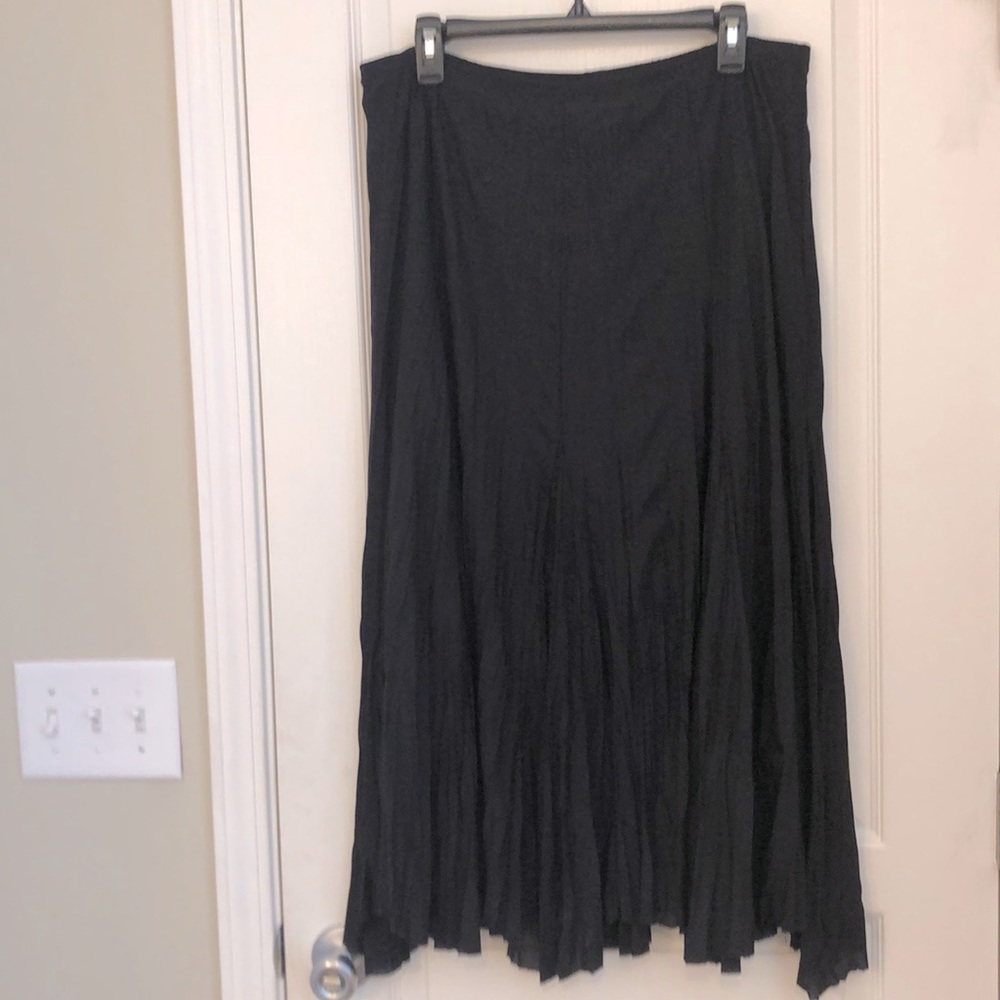 Super sexy women’s Rafeal essential long flowing black skirt 100% polyester.NWOT